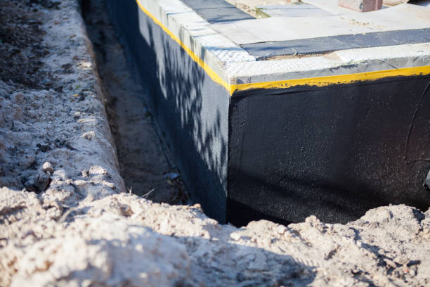 Professional Waterproofing technician working in Taylorsville, NC